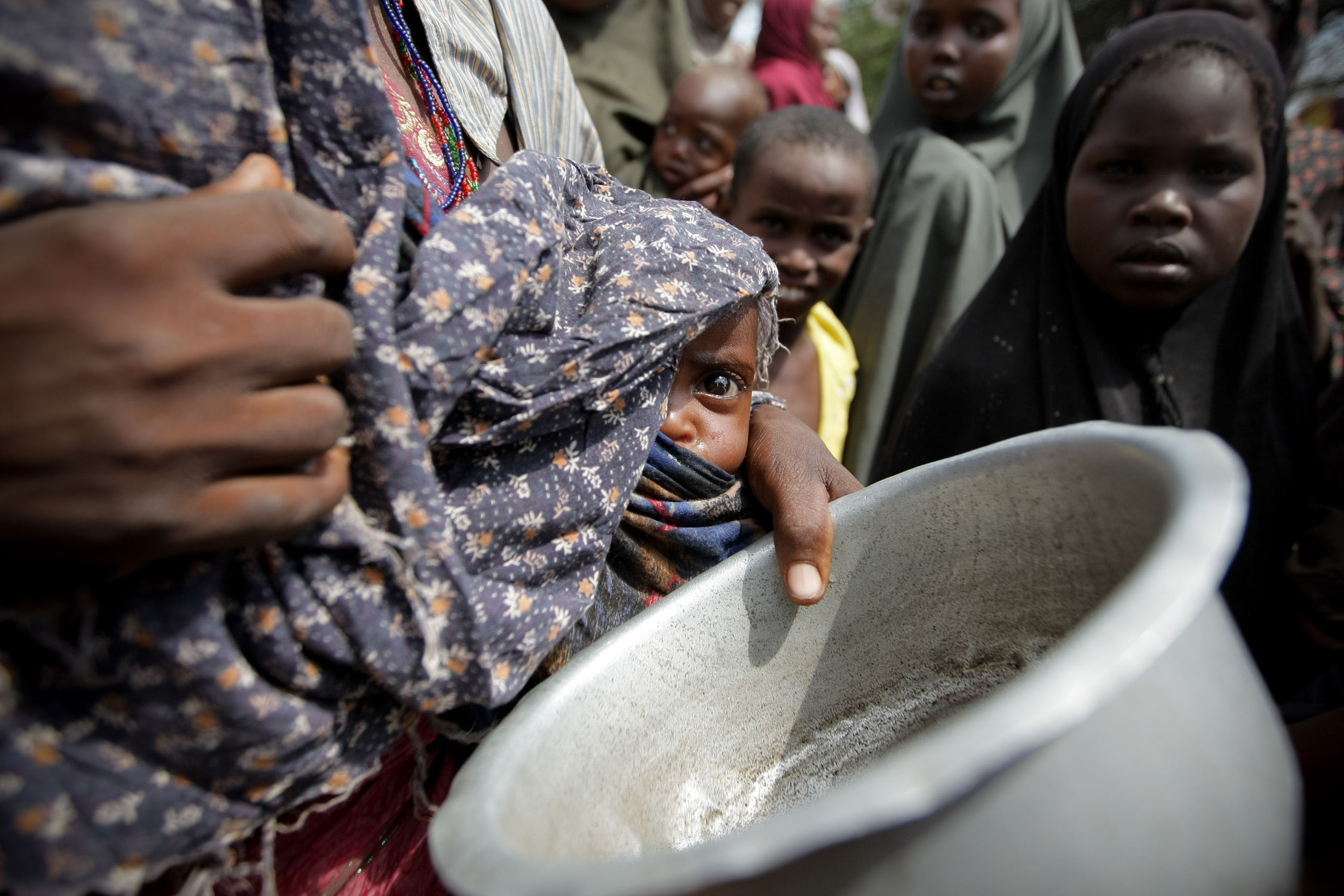 Лицо голода. Голодающие дети Сомали. Голодающие африканские дети.