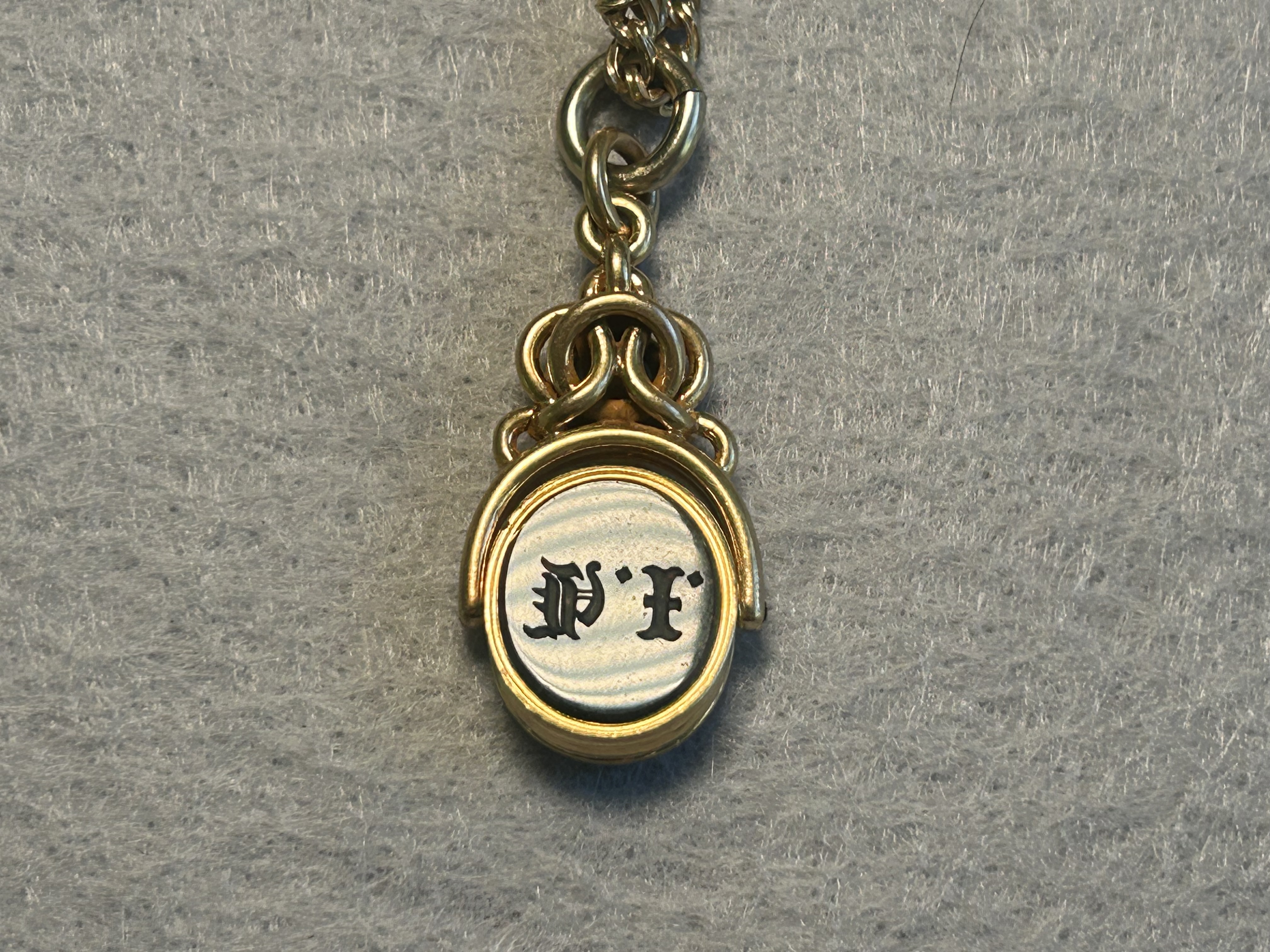 Watch fob with initials