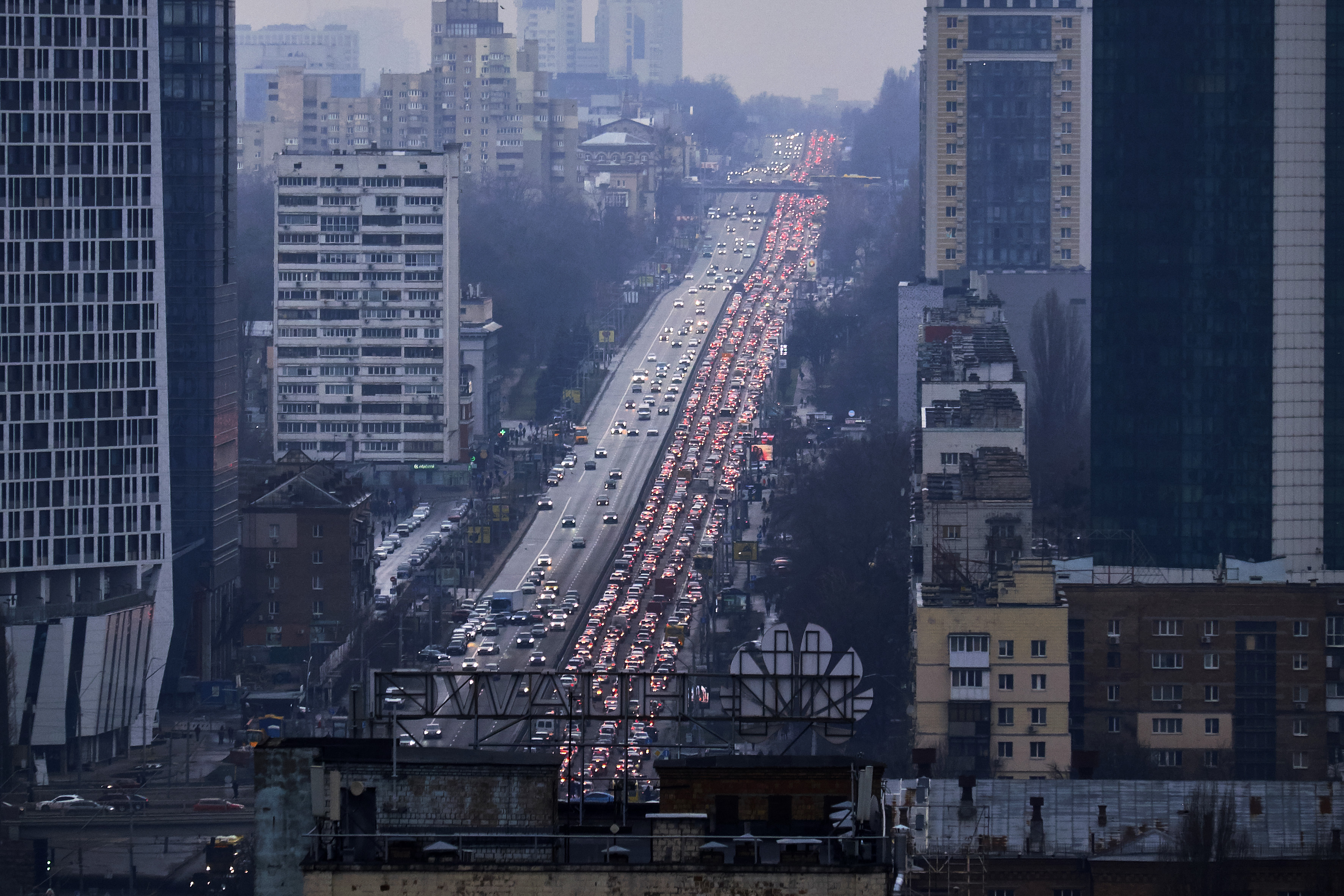 Residents of Kyiv leave the city following pre-offensive missile strikes by the Russian armed forces and Belarus on February 24, 2022.