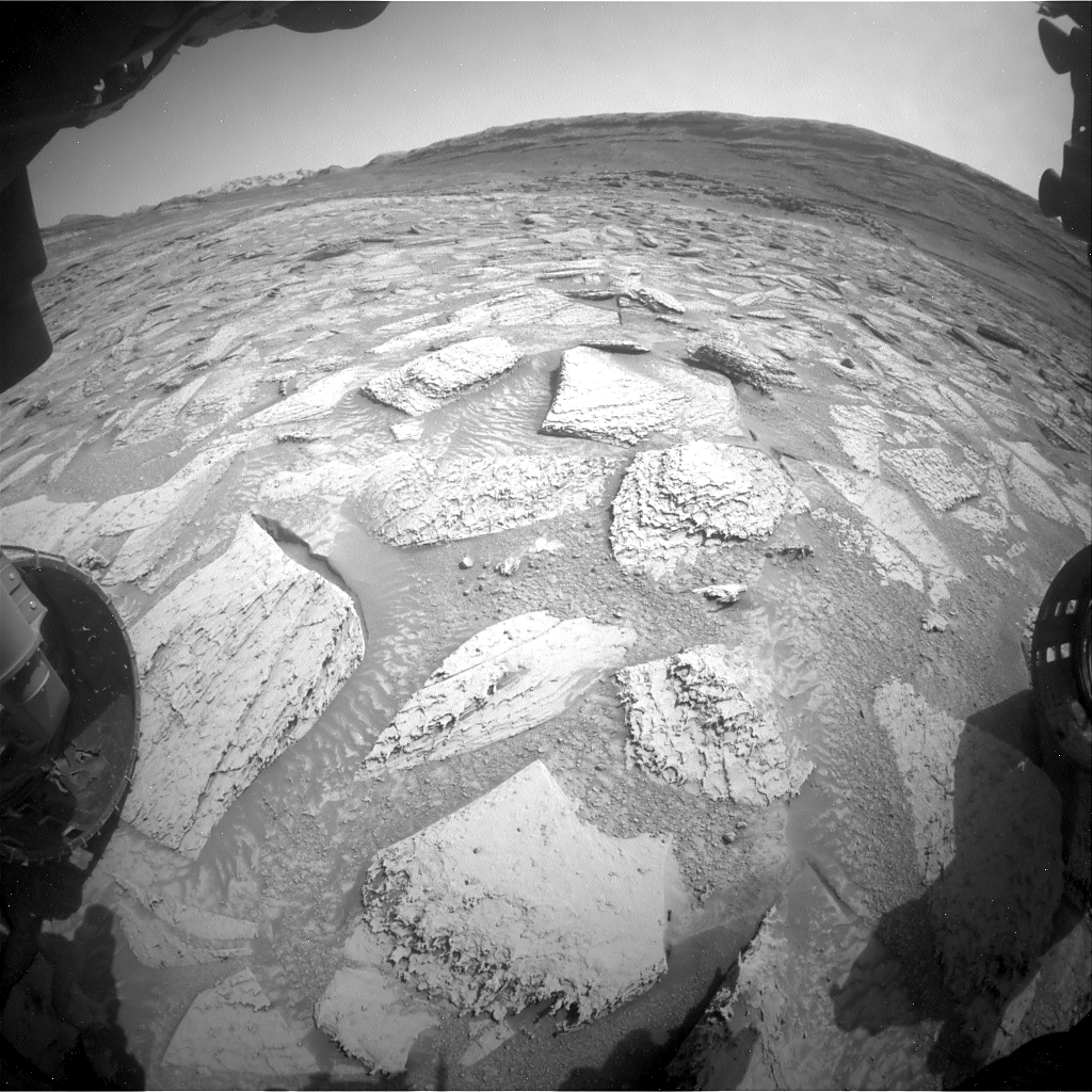 NASA's Curiosity Rover Had a Martian Rock Stuck on Its Arm for Days. Watch It Finally Shake the Stubborn Stone Off